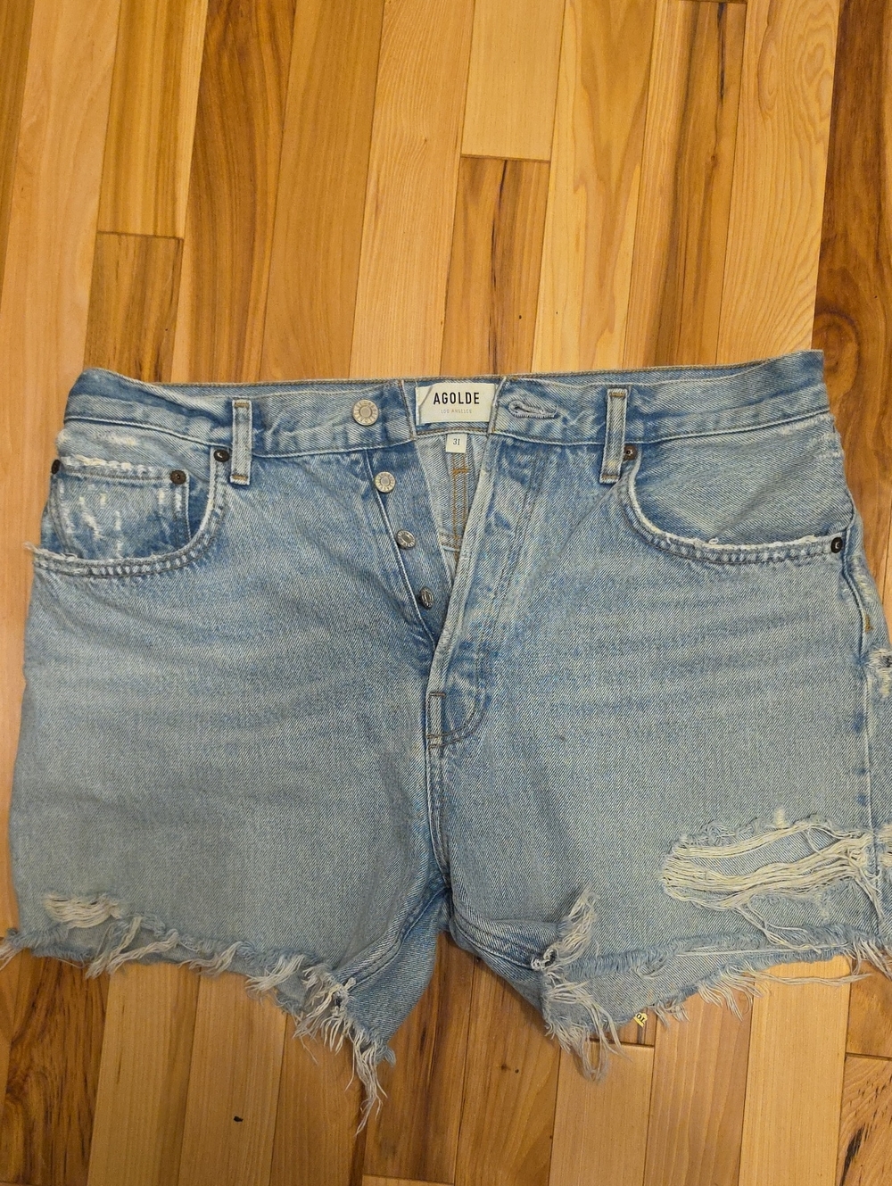 Agolde Light Wash Distressed Jean Shorts